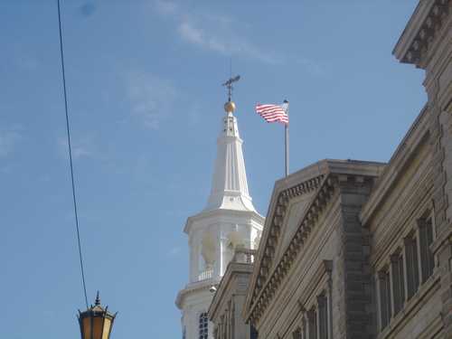 Beautiful white steeple and American Flag flying: Charleston Main Street