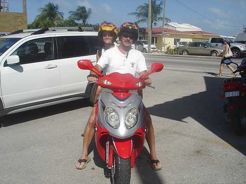 Rosella and Bill on scooter in Grand Cayman